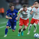 08.09.2024., Opus Arena, Osijek - UEFA Liga nacija, Liga A, skupina 1, 2. kolo, Hrvatska - Poljska. Luka Modric, Pawel Dawidowicz, Kacper Urbanski. Photo: Davor Javorovic/PIXSELL