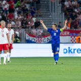 08.09.2024., Opus Arena, Osijek - UEFA Liga nacija, Liga A, skupina 1, 2. kolo, Hrvatska - Poljska. Jakub Kaminski, Luka Modric. Photo: Borna jaksic/PIXSELL