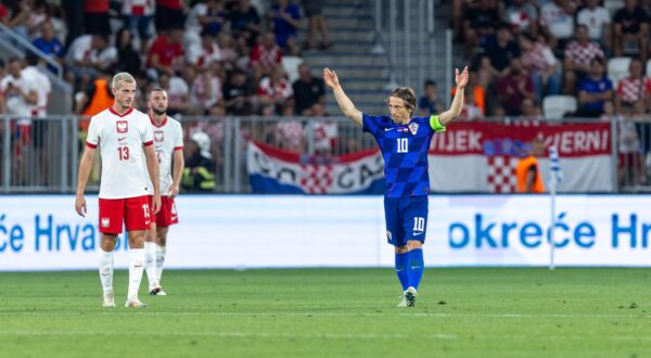 08.09.2024., Opus Arena, Osijek - UEFA Liga nacija, Liga A, skupina 1, 2. kolo, Hrvatska - Poljska. Jakub Kaminski, Luka Modric. Photo: Borna jaksic/PIXSELL