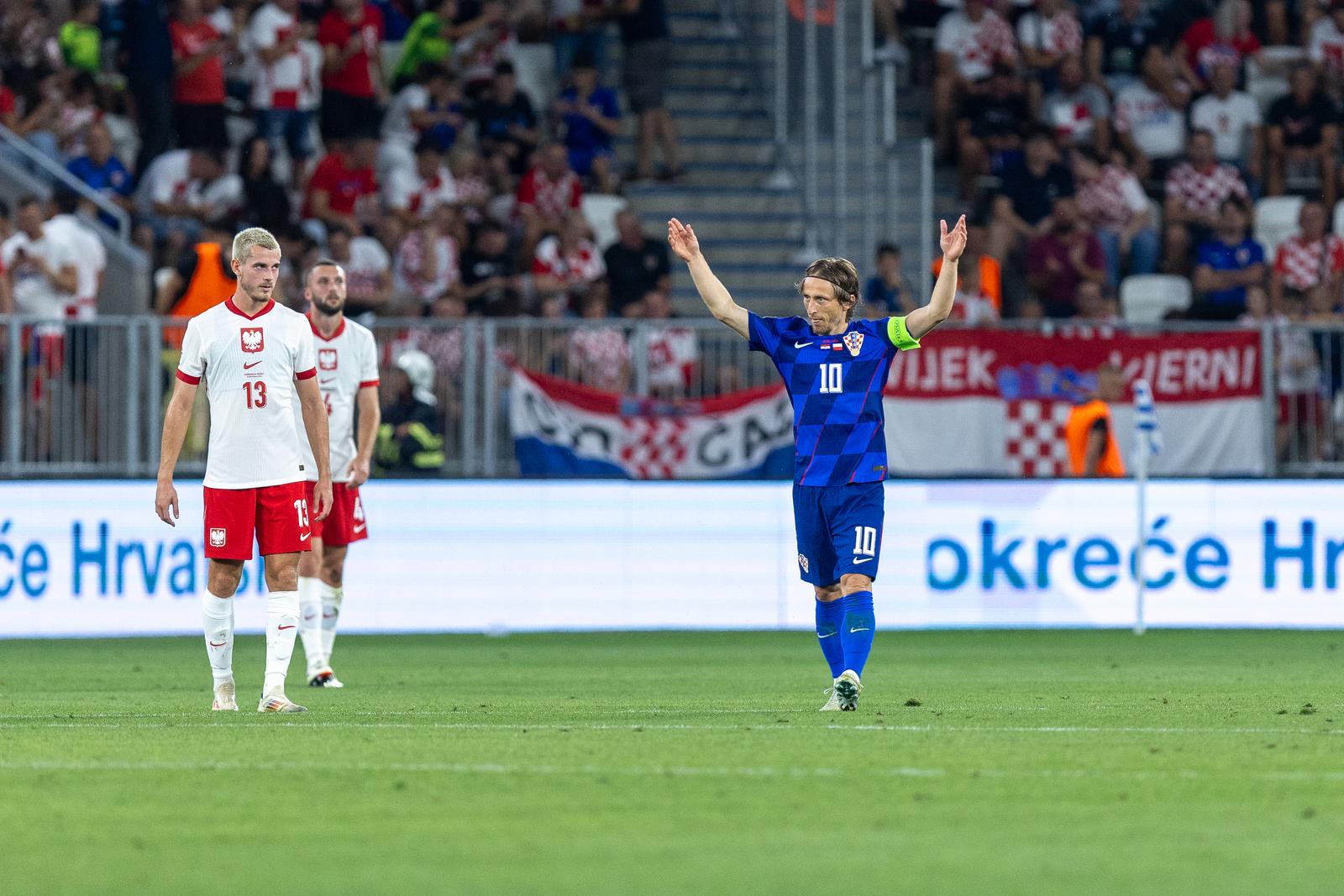 08.09.2024., Opus Arena, Osijek - UEFA Liga nacija, Liga A, skupina 1, 2. kolo, Hrvatska - Poljska. Jakub Kaminski, Luka Modric. Photo: Borna jaksic/PIXSELL