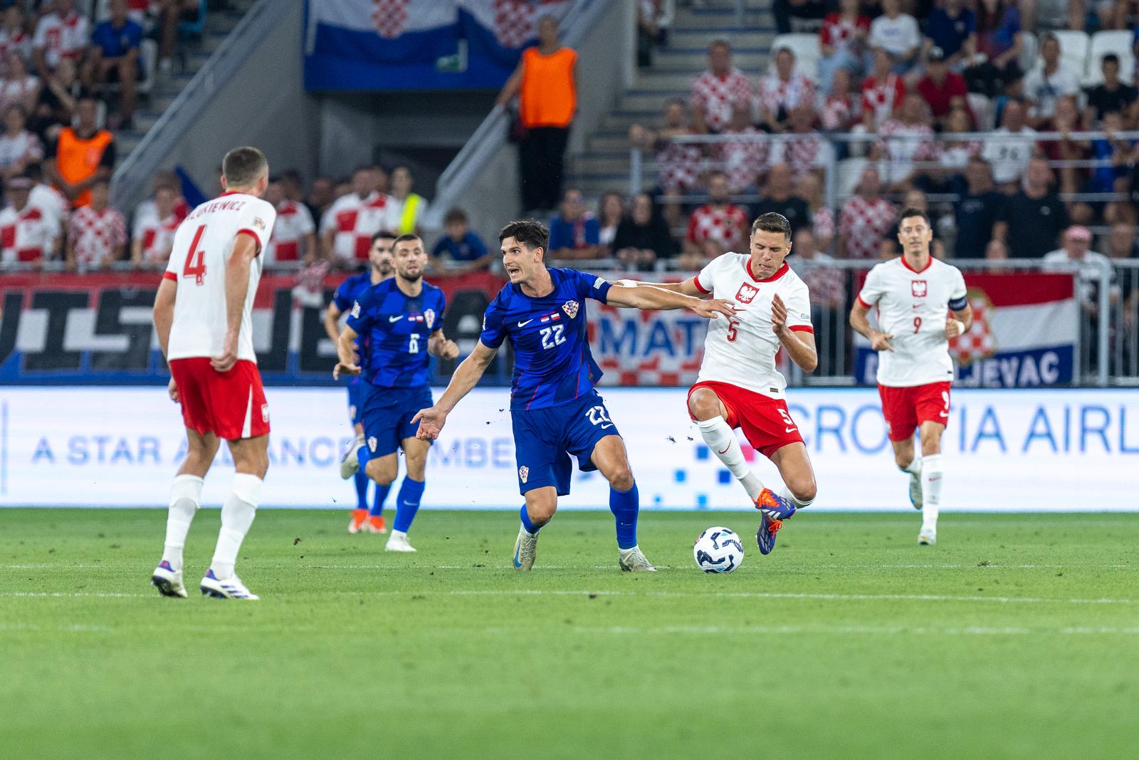 08.09.2024., Opus Arena, Osijek - UEFA Liga nacija, Liga A, skupina 1, 2. kolo, Hrvatska - Poljska. Jan Bednarek, Igor Matanovic, Josip Sutalo, Sebastian Walukiewicz. Photo: Borna jaksic/PIXSELL