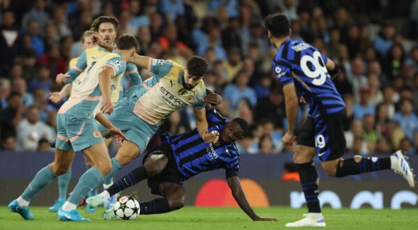 Soccer Football - Champions League - Manchester City v Inter Milan - Etihad Stadium, Manchester, Britain - September 18, 2024 Inter Milan's Marcus Thuram in action with Manchester City's Josko Gvardiol REUTERS/Phil Noble Photo: Phil Noble/REUTERS