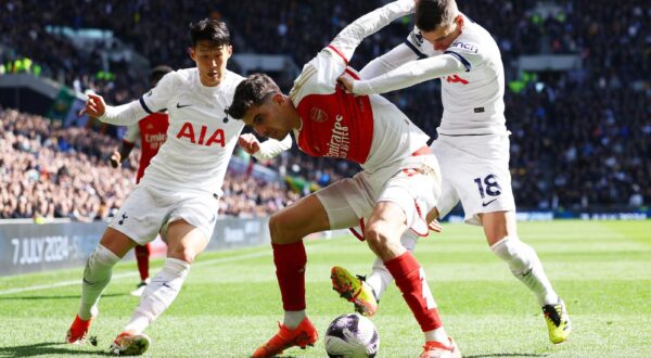 Soccer Football - Premier League - Tottenham Hotspur v Arsenal - Tottenham Hotspur Stadium, London, Britain - April 28, 2024 Arsenal's Kai Havertz in action with Tottenham Hotspur's Son Heung-min and Giovani Lo Celso Action Images via Reuters/Paul Childs NO USE WITH UNAUTHORIZED AUDIO, VIDEO, DATA, FIXTURE LISTS, CLUB/LEAGUE LOGOS OR 'LIVE' SERVICES. ONLINE IN-MATCH USE LIMITED TO 45 IMAGES, NO VIDEO EMULATION. NO USE IN BETTING, GAMES OR SINGLE CLUB/LEAGUE/PLAYER PUBLICATIONS. Photo: Paul Childs/REUTERS