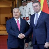 epa11627711 North Macedonia's Prime Minister Hristijan Mickoski (R) and Hungarian Prime Minister Viktor Orban (L) shake hands ahead of their meeting in Ohrid, Republic of North Macedonia, 27 September 2024. Hungarian Prime Minister Orban is on an official visit to North Macedonia focusing on bilateral cooperation.  EPA/GEORGI LICOVSKI