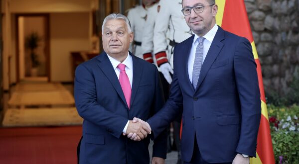 epa11627711 North Macedonia's Prime Minister Hristijan Mickoski (R) and Hungarian Prime Minister Viktor Orban (L) shake hands ahead of their meeting in Ohrid, Republic of North Macedonia, 27 September 2024. Hungarian Prime Minister Orban is on an official visit to North Macedonia focusing on bilateral cooperation.  EPA/GEORGI LICOVSKI