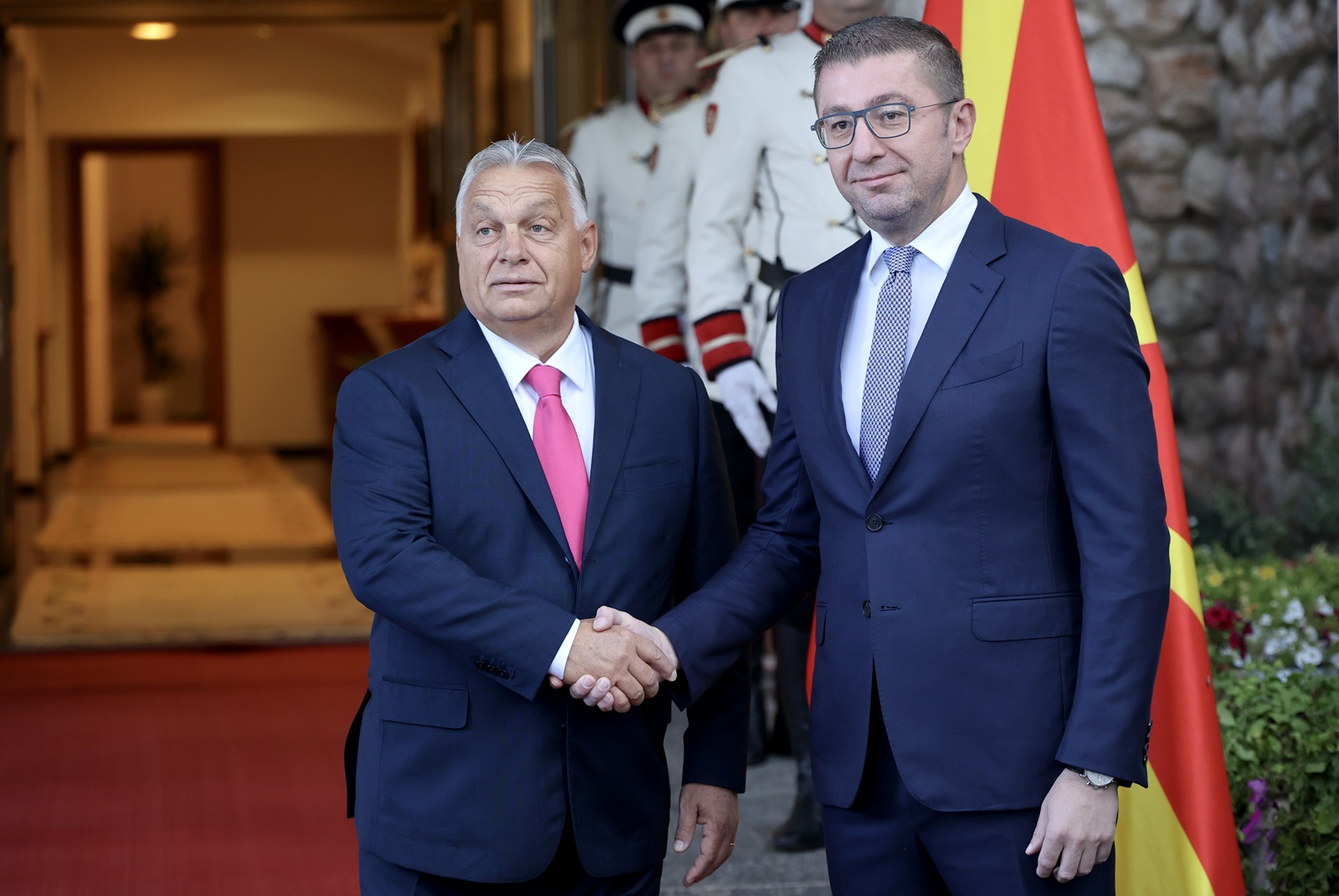 epa11627711 North Macedonia's Prime Minister Hristijan Mickoski (R) and Hungarian Prime Minister Viktor Orban (L) shake hands ahead of their meeting in Ohrid, Republic of North Macedonia, 27 September 2024. Hungarian Prime Minister Orban is on an official visit to North Macedonia focusing on bilateral cooperation.  EPA/GEORGI LICOVSKI