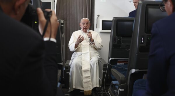 epa11602739 Pope Francis speaks during a news conference aboard the papal plane on his flight back after his 12-day journey across Southeast Asia and Oceania, 13 September 2024. Pope Francis visited Singapore from 11 to 13 September, marking the final stop of his apostolic journey through the Asia-Pacific region, which also included Indonesia, Papua New Guinea, and East Timor.  EPA/Guglielmo Mangiapane / POOL