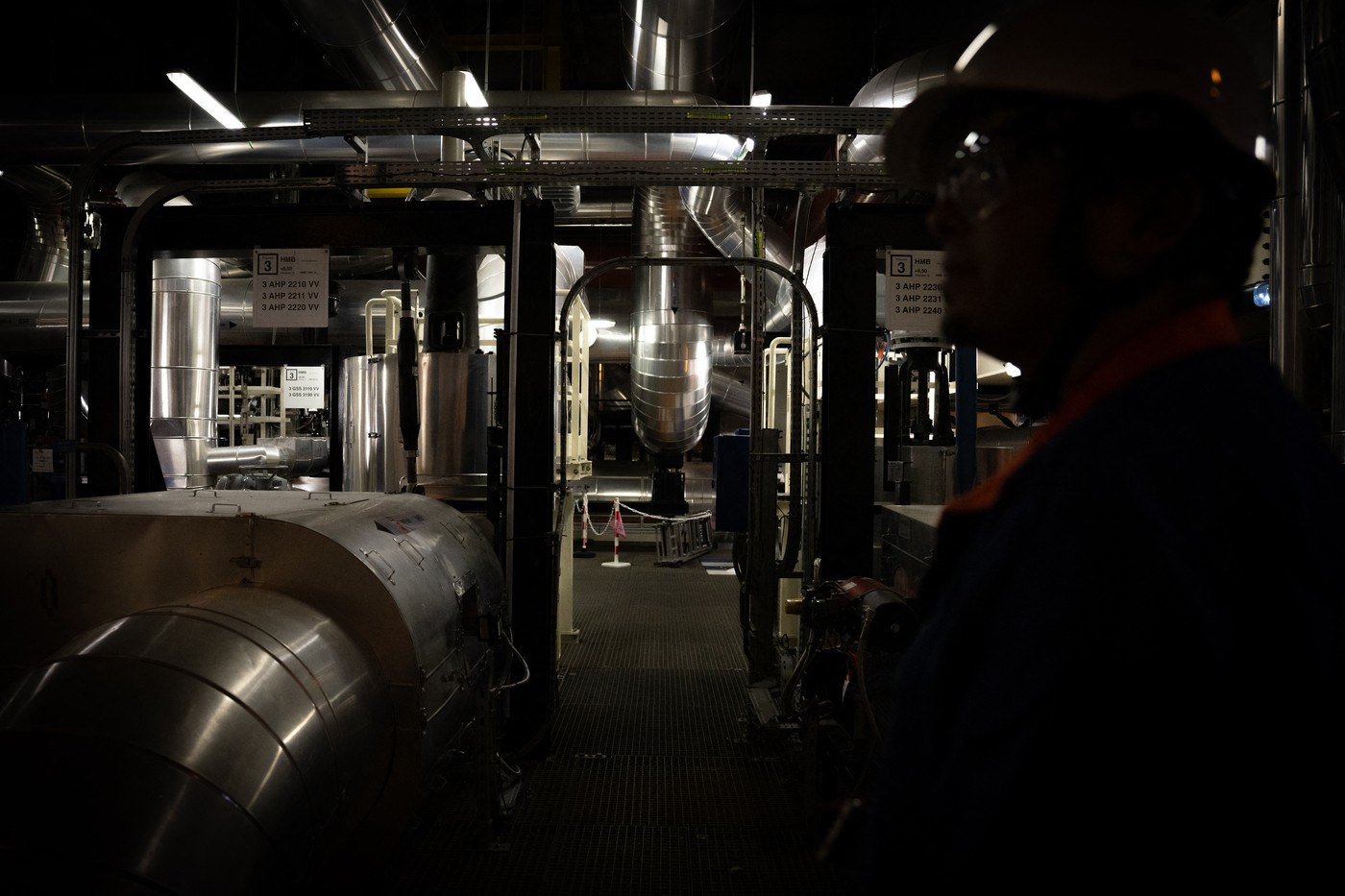 An employee of French state-controlled energy giant EDF walks in the "machines' area" in a building of the nuclear power plant of Flamanville, north-western France, as the Flamanville 3 nuclear power plant is ready to operate, on April 25, 2024.,Image: 868072219, License: Rights-managed, Restrictions: , Model Release: no, Credit line: Lou BENOIST / AFP / Profimedia