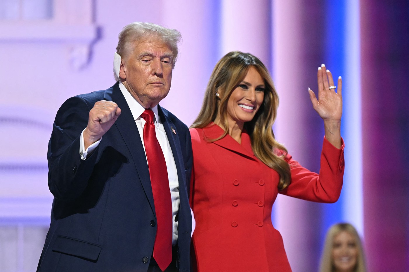 US former President and 2024 Republican presidential candidate Donald Trump raises a fist next to former US First Lady Melania Trump during the last day of the 2024 Republican National Convention at the Fiserv Forum in Milwaukee, Wisconsin, on July 18, 2024. Donald Trump will get a hero's welcome Thursday as he accepts the Republican Party's nomination to run for US president in a speech capping a convention dominated by the recent attempt on his life.,Image: 890745775, License: Rights-managed, Restrictions: , Model Release: no, Credit line: Patrick T. Fallon / AFP / Profimedia