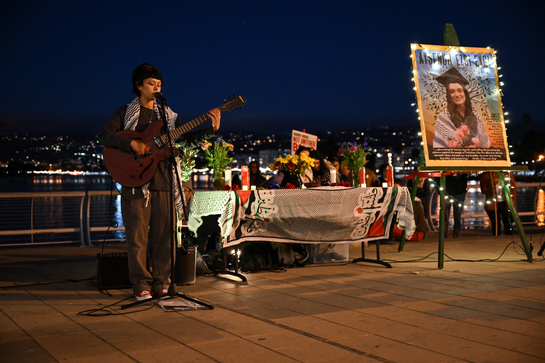 OAKLAND, CALIFORNIA - SEPTEMBER 9: Aysenur Ezgi's best friend and schoolmate Cody Choi plays and sings for her as crowds are gathered at Lake Merritt to commemorate Aysenur Ezgi Eygi and to protest Israel, in Oakland, California, United States on September 9, 2024 after 26 years old Turkish-American woman Aysenur Ezgi who was killed by Israeli soldiers in Nablus, as she was standing in solidarity with the Palestinian people. Tayfun Coskun / Anadolu/ABACAPRESS.COM,Image: 906252569, License: Rights-managed, Restrictions: , Model Release: no, Credit line: AA/ABACA / Abaca Press / Profimedia