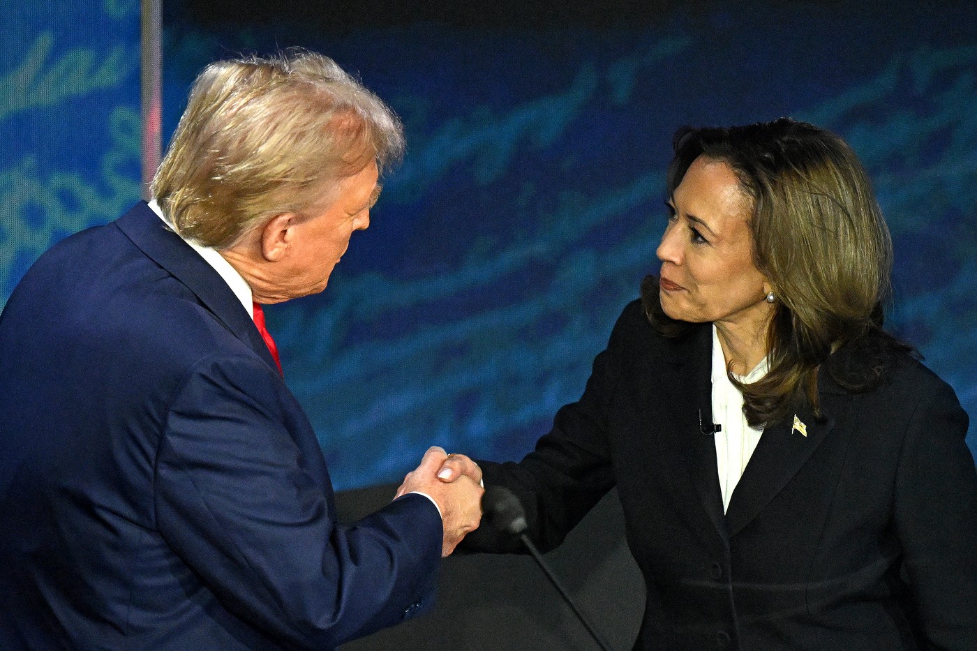 US Vice President and Democratic presidential candidate Kamala Harris (R) shakes hands with former US President and Republican presidential candidate Donald Trump during a presidential debate at the National Constitution Center in Philadelphia, Pennsylvania, on September 10, 2024.,Image: 906555981, License: Rights-managed, Restrictions: , Model Release: no, Credit line: SAUL LOEB / AFP / Profimedia