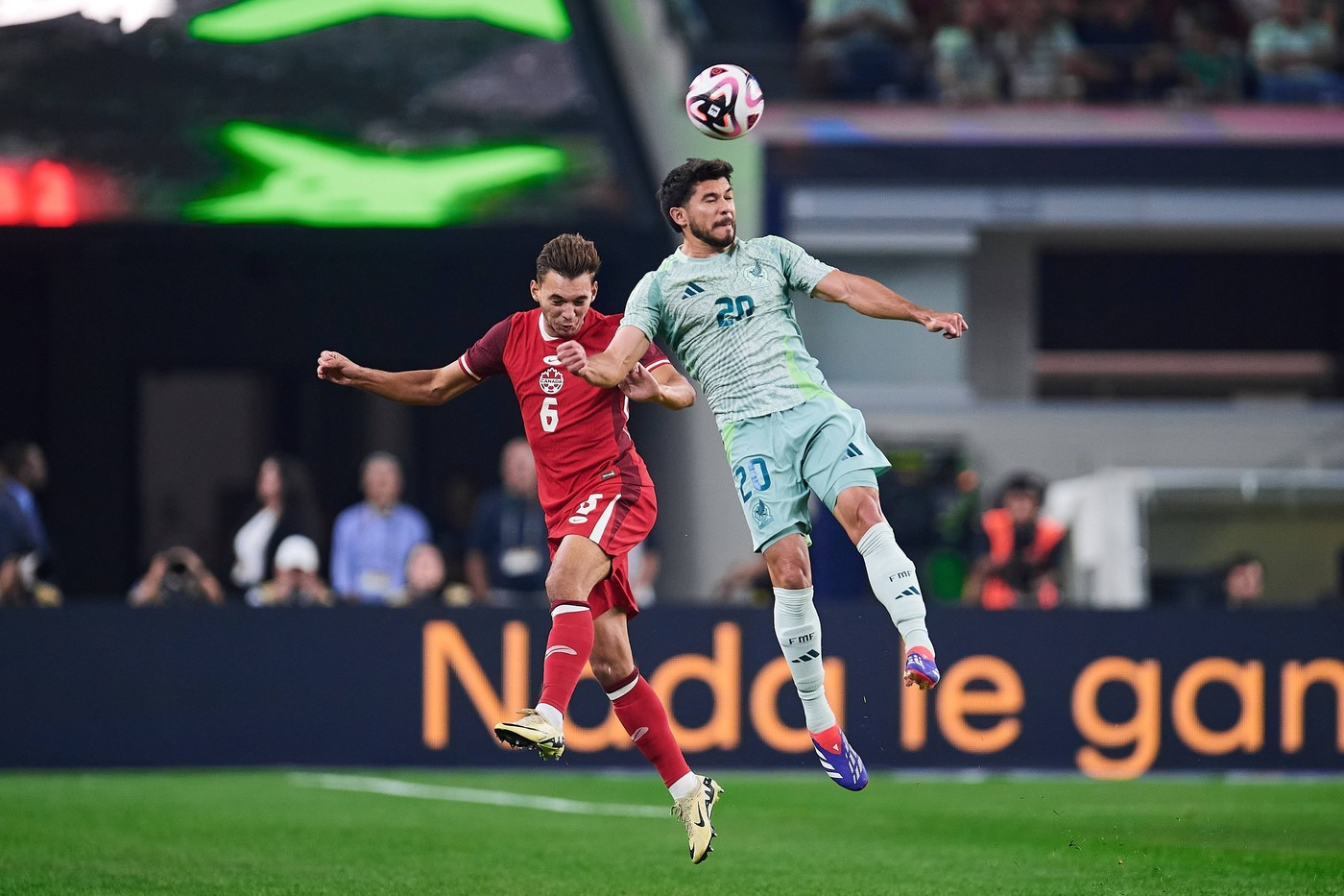 RECORD DATE NOT STATED Seleccion Mexicana 2024 Mexico vs Canada Niko Sigur L of Canada jumps for the ball with Henry Martin of Mexico during the game International Friendly, Länderspiel, Nationalmannschaft between Mexican national team, Nationalteam Mexico and Canada at AT-T Stadium, on September 10, 2024, Arlington, Texas, United States. ARLINGTON TEXAS UNITED STATES Copyright: xJONATHANxDUENASx 20240910214038_SNM_MEX_CAN_MARTIN260,Image: 906562670, License: Rights-managed, Restrictions: PUBLICATIONxNOTxINxMEXxCHNxRUS, Model Release: no, Credit line: JONATHAN DUENAS / imago sportfotodienst / Profimedia