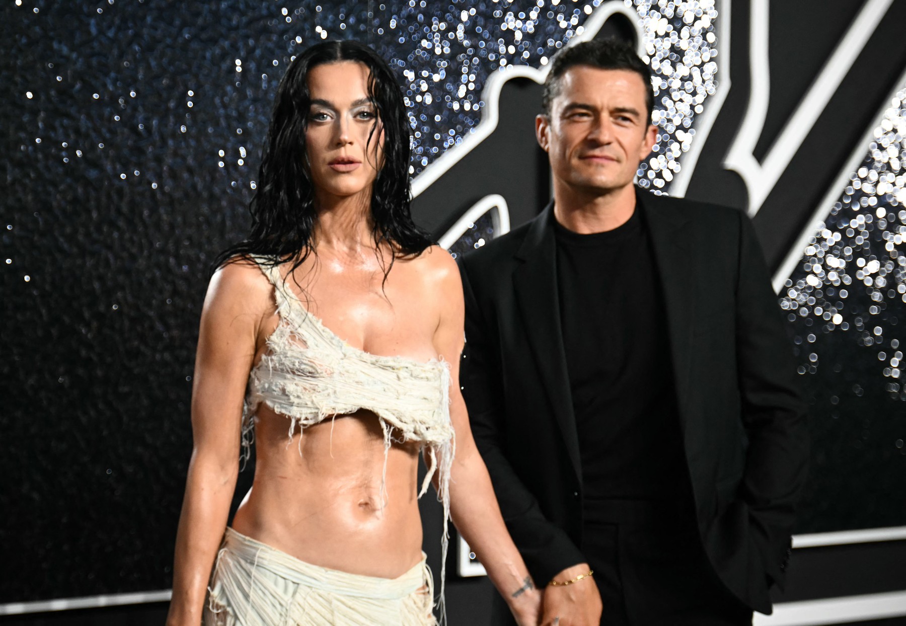 US singer Katy Perry and partner English actor Orlando Bloom arrive to attend the MTV Video Music Awards at UBS Arena in Elmont, New York, on September 11, 2024.,Image: 906801759, License: Rights-managed, Restrictions: , Model Release: no, Credit line: ANGELA WEISS / AFP / Profimedia