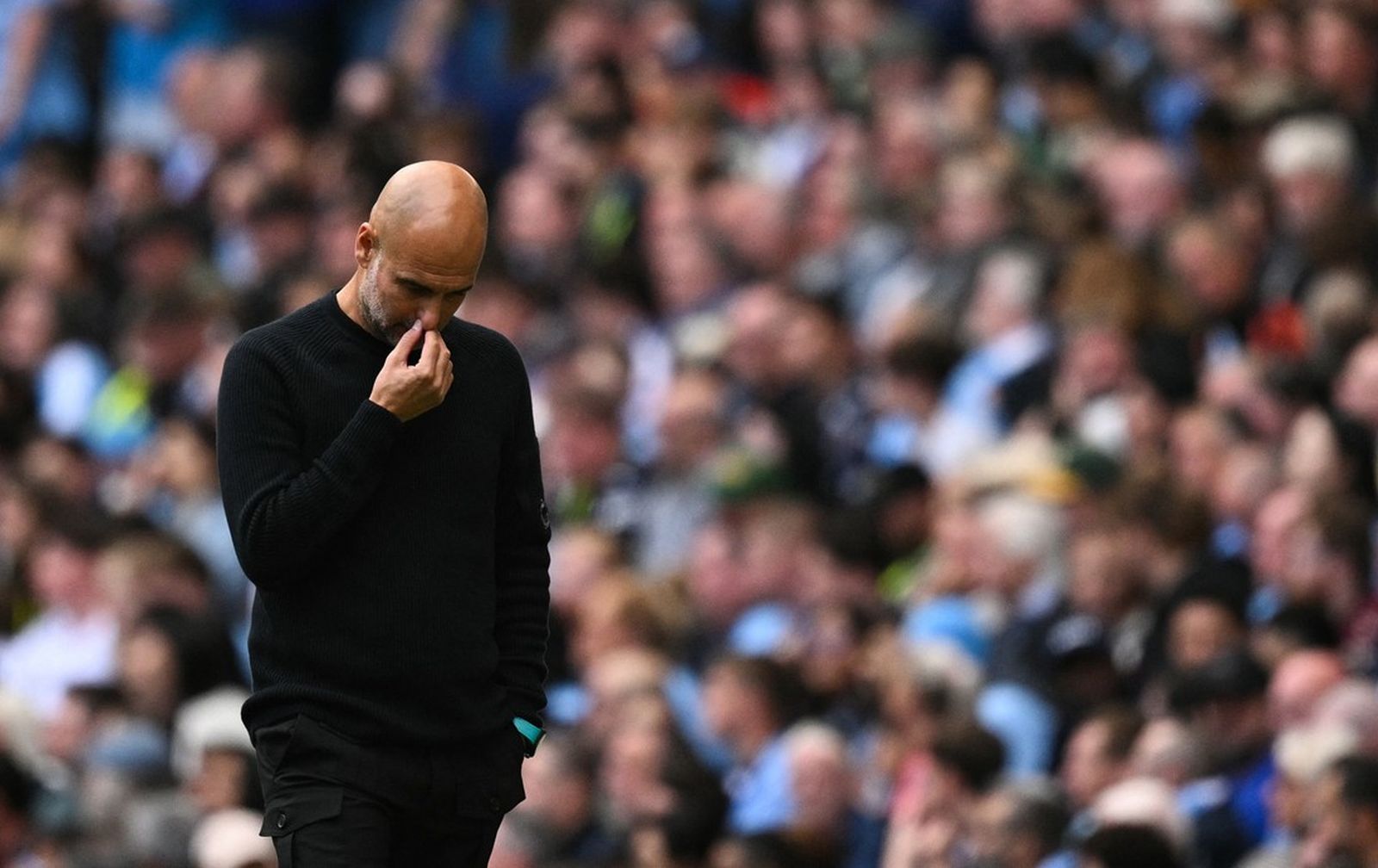 Manchester City's Spanish manager Pep Guardiola reacts during the English Premier League football match between Manchester City and Brentford at the Etihad Stadium in Manchester, north west England, on September 14, 2024.,Image: 907596072, License: Rights-managed, Restrictions: RESTRICTED TO EDITORIAL USE. No use with unauthorized audio, video, data, fixture lists, club/league logos or 'live' services. Online in-match use limited to 120 images. An additional 40 images may be used in extra time. No video emulation. Social media in-match use limited to 120 images. An additional 40 images may be used in extra time. No use in betting publications, games or single club/league/player publications., Model Release: no, Credit line: Oli SCARFF / AFP / Profimedia