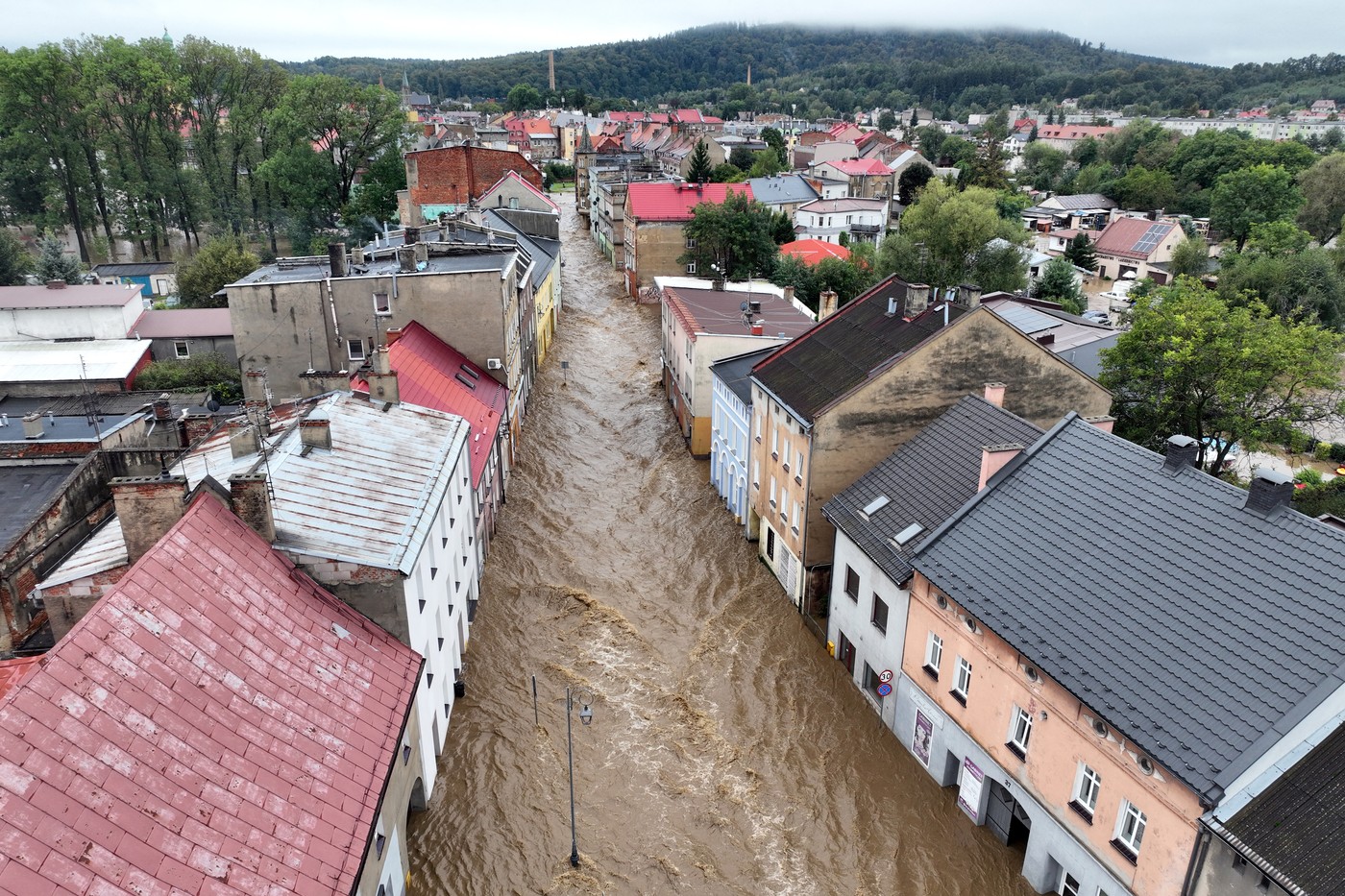 This aerial photograph taken on September 15, 2024 shows a view of the flooded streets in Glucholazy, southern Poland. One person has drowned in Poland and an Austrian fireman has died responding to floods, authorities said, as Storm Boris lashed central and eastern Europe with torrential rains. Since Thursday, September 12, 2024, swathes of Austria, the Czech Republic, Hungary, Romania and Slovakia have been hit by high winds and unusually fierce rainfall. The storm had already caused the death of five people in Romania, and thousands have been evacuated from their homes across the continent.,Image: 907859228, License: Rights-managed, Restrictions: , Model Release: no, Credit line: Sergei GAPON / AFP / Profimedia