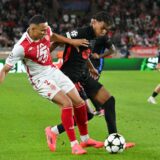 Monaco's Brazilian defender #02 Vanderson De Oliveira Campos (L) fights for the ball with Barcelona's Spanish forward #19 Lamine Yamal during the UEFA Champions League 1st round day 1 football match between AS Monaco and FC Barcelona at the Louis II Stadium in the Principality of Monaco on September 19, 2024.,Image: 909866739, License: Rights-managed, Restrictions: , Model Release: no, Credit line: Miguel MEDINA / AFP / Profimedia