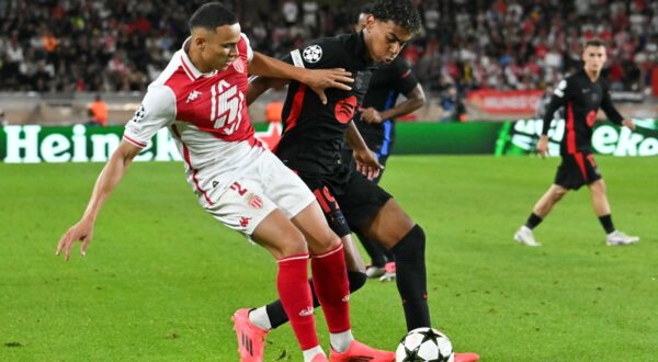 Monaco's Brazilian defender #02 Vanderson De Oliveira Campos (L) fights for the ball with Barcelona's Spanish forward #19 Lamine Yamal during the UEFA Champions League 1st round day 1 football match between AS Monaco and FC Barcelona at the Louis II Stadium in the Principality of Monaco on September 19, 2024.,Image: 909866739, License: Rights-managed, Restrictions: , Model Release: no, Credit line: Miguel MEDINA / AFP / Profimedia