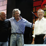 FILE -This is Saturday July 2, 2005 file photo of  Pink Floyd's Dave Gilmore, left, Roger Waters, second left, Nick Mason, second right, and Rick Wright, at the end of their set  at the Live 8 concert in Hyde Park,  London.  In a victory for the concept album, Britain's High Court on Thursday March 11, 2010 ordered record company EMI Group Ltd. to stop selling downloads of Pink Floyd tracks individually rather than as part of the band's original records. The rock group sued the music label, saying its contract prohibited selling the tracks "unbundled" from their original album setting.  (AP Photo/Lefteris Pitarakis, File)