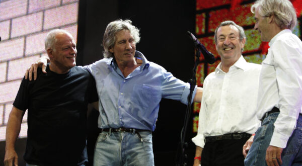 FILE -This is Saturday July 2, 2005 file photo of  Pink Floyd's Dave Gilmore, left, Roger Waters, second left, Nick Mason, second right, and Rick Wright, at the end of their set  at the Live 8 concert in Hyde Park,  London.  In a victory for the concept album, Britain's High Court on Thursday March 11, 2010 ordered record company EMI Group Ltd. to stop selling downloads of Pink Floyd tracks individually rather than as part of the band's original records. The rock group sued the music label, saying its contract prohibited selling the tracks "unbundled" from their original album setting.  (AP Photo/Lefteris Pitarakis, File)