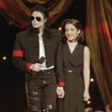 FILE - Michael Jackson and Lisa Marie Presley-Jackson acknowledge applause from the audience after coming out onstage to open the 11th annual MTV Video Music Awards at New York's Radio City Music Hall, Sept. 8, 1994. Presley, singer and only child of Elvis, died Thursday, Jan. 12, 2023, after a hospitalization, according to her mother, Priscilla Presley. She was 54. (AP Photo/Bebeto Matthews, File)