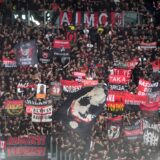 AC Milan's fans cheer before the Serie A soccer match between Roma and AC Milan, at Rome's Olympic stadium, Saturday, April 29, 2023. (AP Photo/Gregorio Borgia) Italy Soccer Serie A