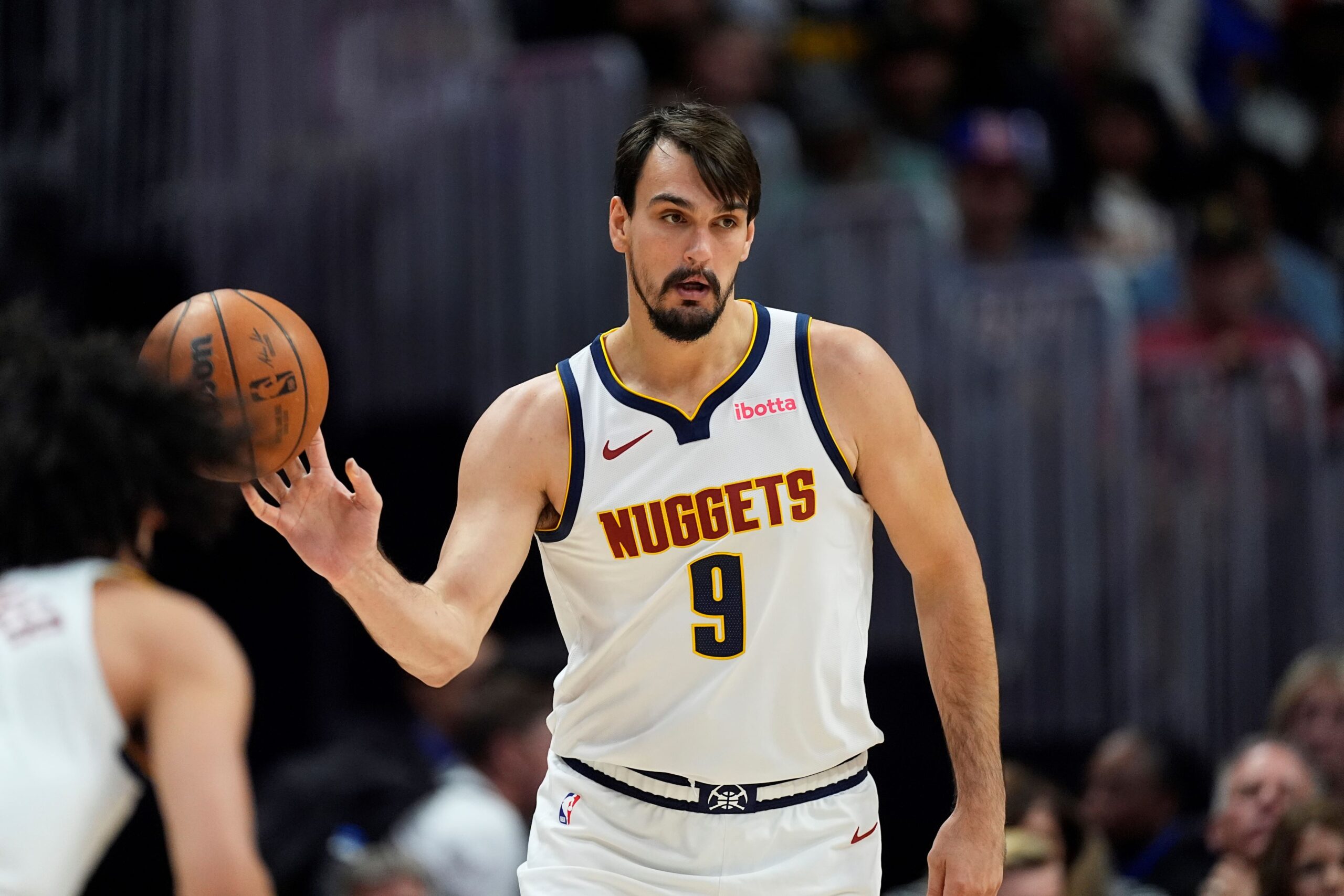 Denver Nuggets forward Dario Saric (9) in the second half of an NBA preseason game Sunday, Oct. 13, 2024, in Denver. (AP Photo/David Zalubowski) Suns Nuggets Basketball