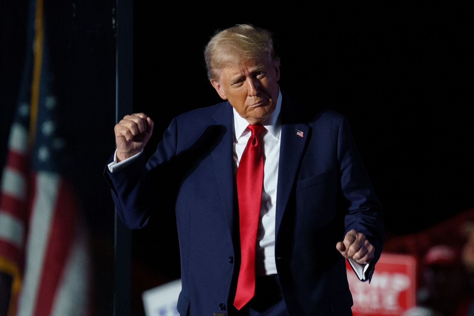 epa11644522 Former US President and Republican presidential nominee Donald Trump finishes remarks at a rally in Butler, Pennsylvania, USA, 05 October 2024. The rally is taking place at the same location where a gunman attempted to assassinate former president Trump in July.  EPA/WILL OLIVER