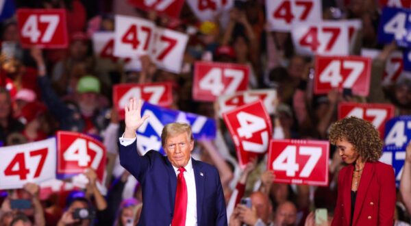 Former US President and Republican presidential candidate Donald Trump waves as he leaves the stage after a town hall at the Convention Center in Lancaster, Pennsylvania, October 20, 2024.,Image: 924130312, License: Rights-managed, Restrictions: , Model Release: no, Credit line: Charly TRIBALLEAU / AFP / Profimedia