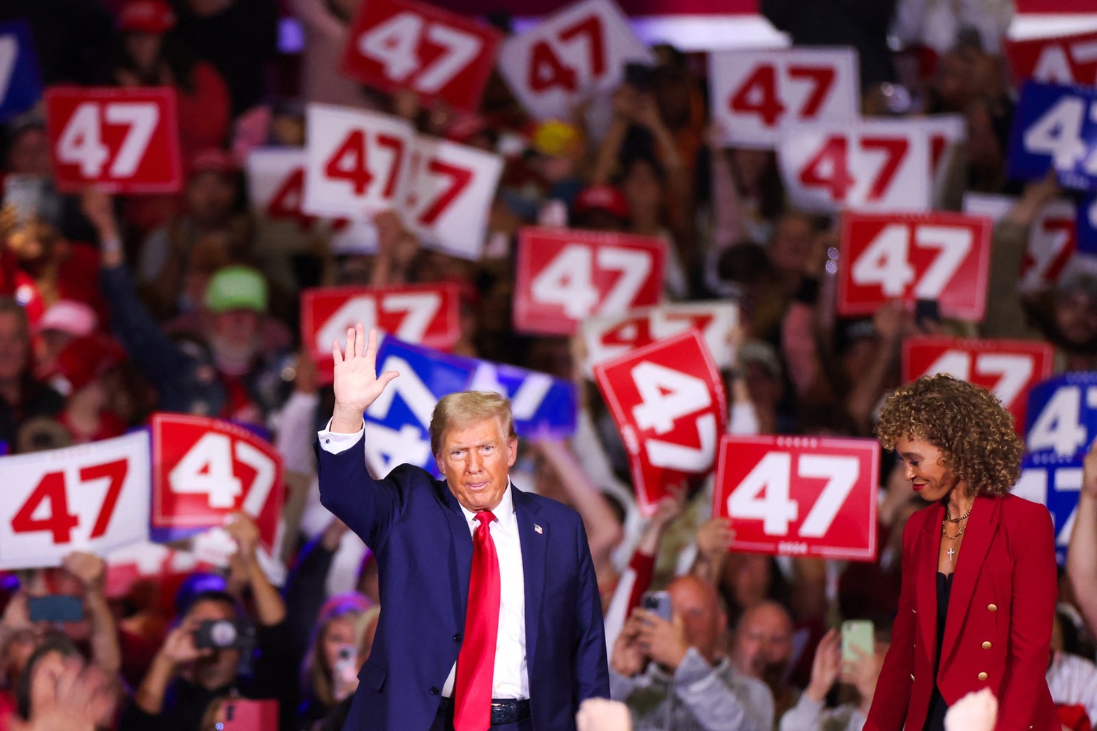 Former US President and Republican presidential candidate Donald Trump waves as he leaves the stage after a town hall at the Convention Center in Lancaster, Pennsylvania, October 20, 2024.,Image: 924130312, License: Rights-managed, Restrictions: , Model Release: no, Credit line: Charly TRIBALLEAU / AFP / Profimedia