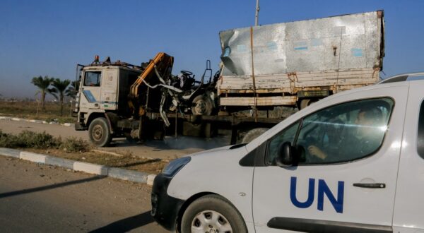 A United Nations (UN) vehicle near a destroyed van, with UN Relief and Works Agency (UNRWA) markings, following an Israeli strike on Salah al-Din Street south of Deir al-Balah, central Gaza, on Wednesday, October 23, 2024. Hospitals and shelters for Palestinians seeking refuge have come under siege in northern Gaza as Israeli forces intensified their attacks on Hamas. Medical supplies are running desperately low. The UN Palestinian refugee agency UNRWA has accused Israel of preventing supplies of food and medicine from reaching areas in the north of Gaza.,Image: 925755915, License: Rights-managed, Restrictions: , Model Release: no, Credit line: Middle East Images/ABACA / Abaca Press / Profimedia