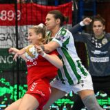 epa11604202 Dragana Cvijic (C) of FTC-Rail Cargo Hungaria challenges Klara Birtic of Koprivnica for the ball during the EHF Women's Champions League Group A second round match between FTC-Rail Cargo Hungaria and RK Podravka Koprivnica in Erd, Hungary, 14 September 2024.  EPA/Tibor Illyes HUNGARY OUT