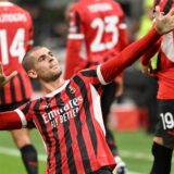 epa11629330 AC Milan’s Alvaro Morata celebrates after scoring the 1-0 goal during the Italian Serie A soccer match between AC Milan and US Lecce, in Milan, Italy, 27 September 2024.  EPA/DANIEL DAL ZENNARO