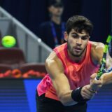 epa11632036 Carlos Alcaraz of Spain in action during his Men's Singles second round match against Tallon Griekspoor of Netherlands in the China Open tennis tournament in Beijing, China, 29 September 2024.  EPA/WU HAO