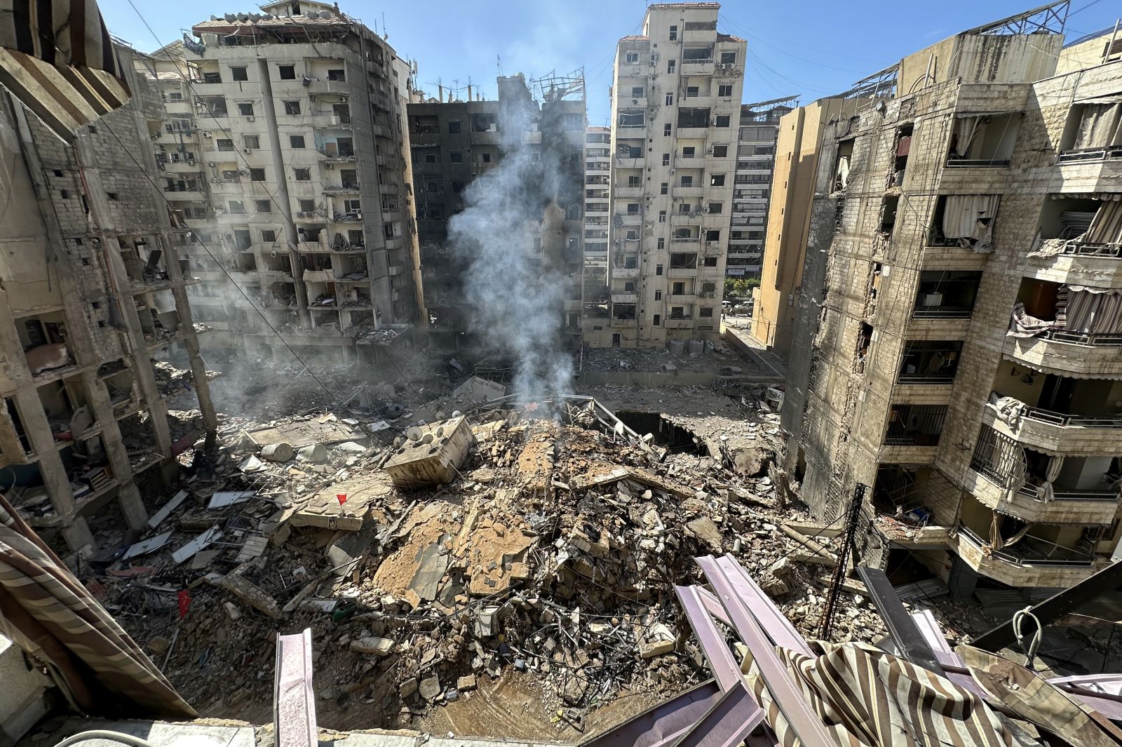 epa11637860 Damaged buildings following an overnight Israeli military strike, in the southern suburbs of Beirut, Lebanon, 02 October 2024. According to the Lebanese National News Agency (NNA),  Israeli warplanes conducted a series of raids against multiple neighborhoods in the southern suburbs of Beirut (Dahieh) on the evening of 01 October. On 30 September Israel announced the beginning of a 'limited, localized and targeted' ground operation against Hezbollah in southern Lebanon.  EPA/WAEL HAMZEH