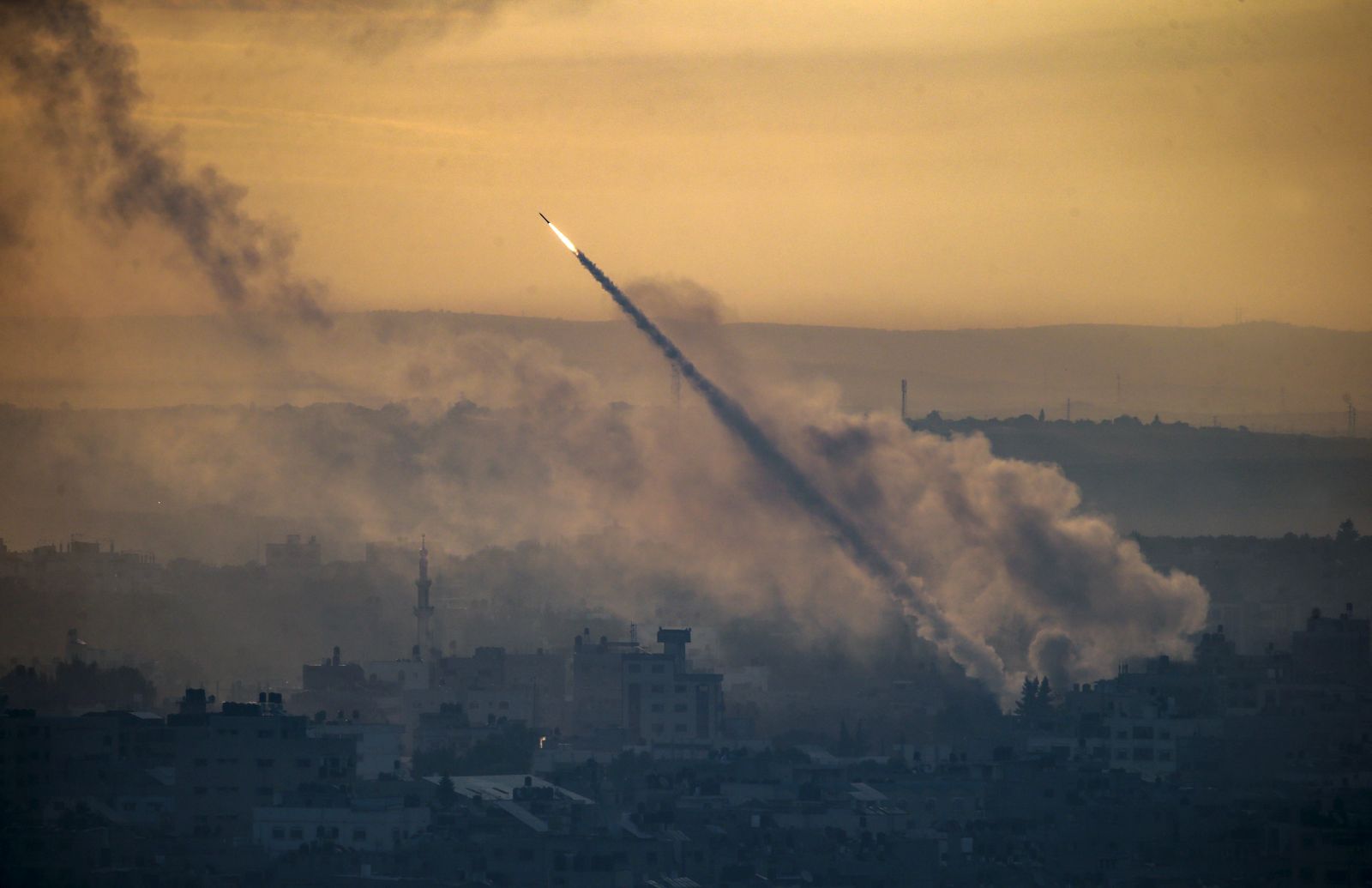 epa11638058 (FILE) - A rocket is launched from the coastal Gaza strip towards Israel by militants of the Ezz Al-Din Al Qassam militia, the military wing of Hamas movement, in Gaza City, 07 October 2023 (reissued 02 October 2024). Upcoming 07 October 2024, marks one year since the Palestinian militant group Hamas launched a surprise attack on Israel, killing 1,200, and one year since Israel began its war on Gaza, killing more than 41,000 and destroying the Palestinian enclave. On 07 October 2023, armed Palestinian groups led by Hamas launched a deadly assault on Israel, with rocket launches and thousands of militants breaching the Gaza-Israel security barrier to attack Israeli communities and military bases near Gaza and central Israel and taking dozens of hostages. Israel, then, officially declared a state of war against Hamas, setting the stage for a major military response in the strip.  EPA/MOHAMMED SABER