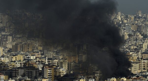 epa11639243 Smoke rises following an Israeli airstrike in Dahieh, a southern suburb controlled by Hezbollah in Beirut, Lebanon, 03 October 2024. The Lebanese National News Agency (NNA) said that Israeli airstrikes were carried out overnight in the southern suburb, along with shelling from warships at sea.  EPA/WAEL HAMZEH