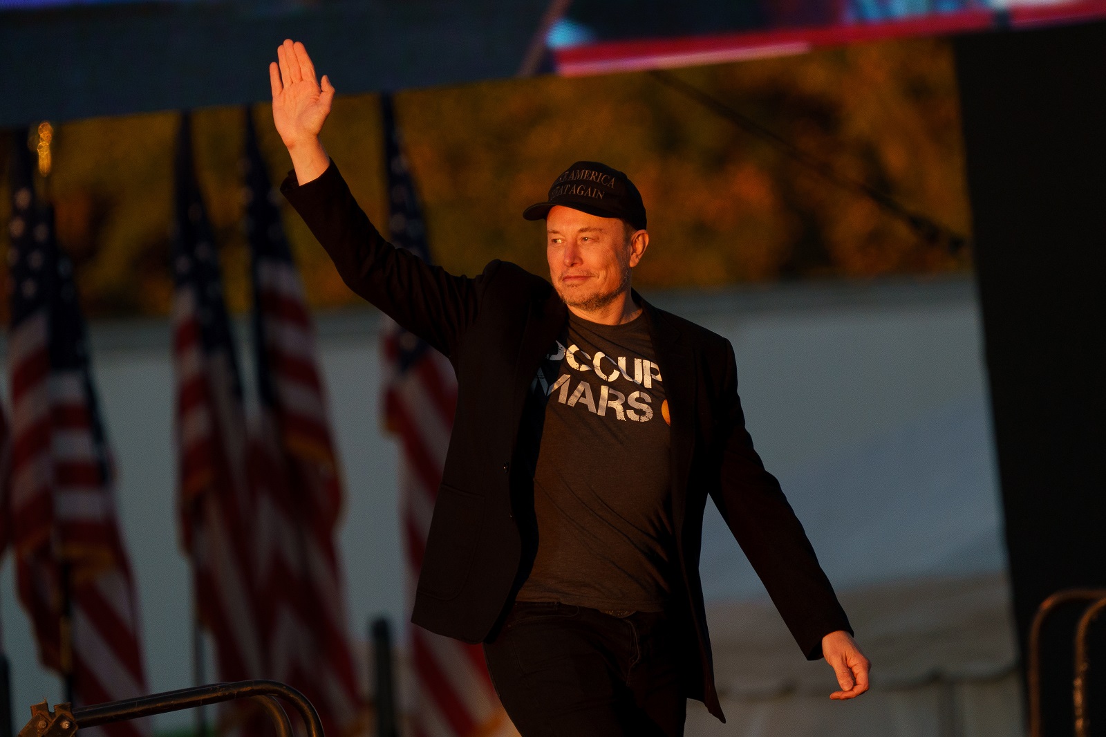 epa11644530 Businessperson Elon Musk at the Butler Farm Show where former US President and Republican presidential nominee Donald Trump held a rally in Butler, Pennsylvania, USA, 05 October 2024. The rally is taking place at the same location where a gunman attempted to assassinate former president Trump in July.  EPA/WILL OLIVER