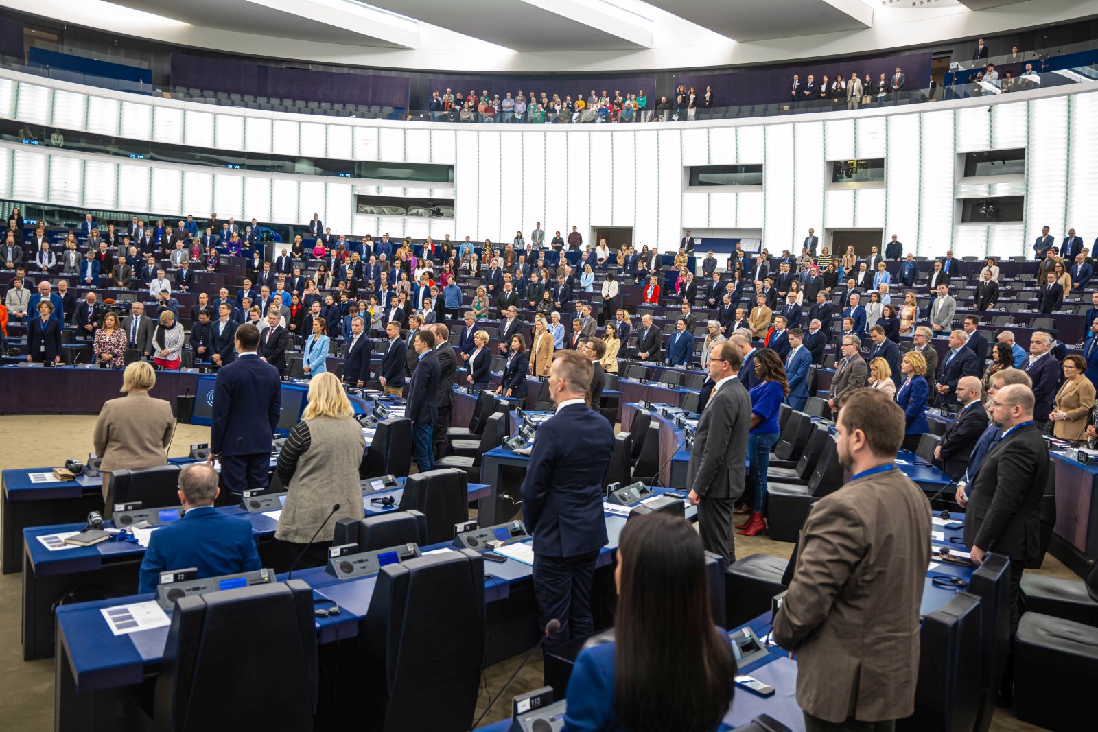 epa11647684 Members of the European Parliament stand during a minute of silence to pay tribute to the victims of the 07 October Hamas attack on Isreal upon the opening of the plenary session at the European Parliament in Strasbourg, France, 07 October 2024.   EPA/CHRISTOPHE PETIT TESSON