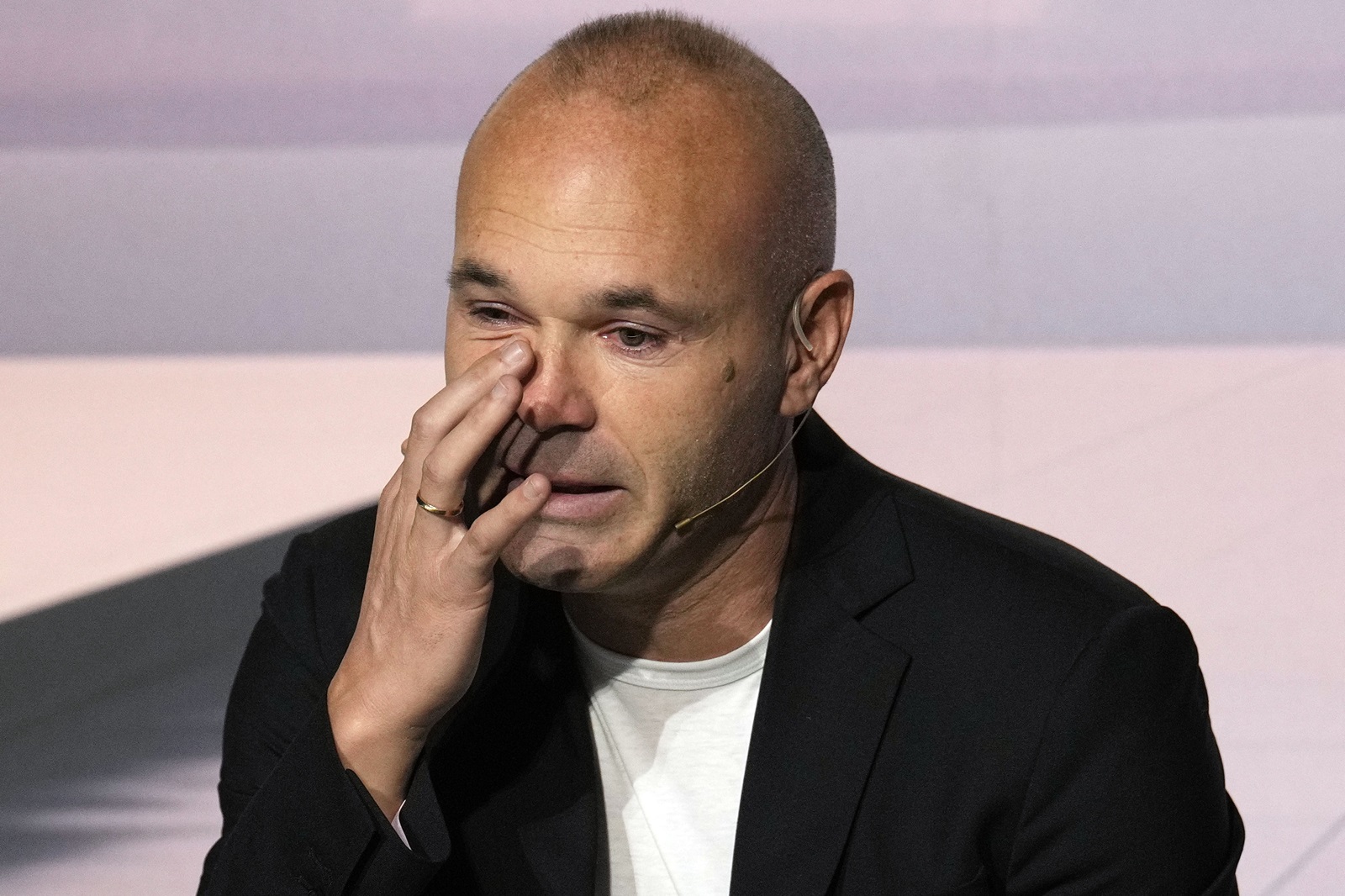 epa11648777 Spanish soccer player Andres Iniesta announces his retirement from professional soccer during the press conference held in Barcelona, Catalonia, Spain, 08 October 2024.  EPA/Alejandro Garcia