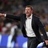 epa11652300 Tony Popovic, head coach of Australia, gives instructions to his players during the Men's World Cup 2026 qualifier match between Australia and China at Adelaide Oval in Adelaide, Australia, 10 October 2024.  EPA/MATT TURNER AUSTRALIA AND NEW ZEALAND OUT