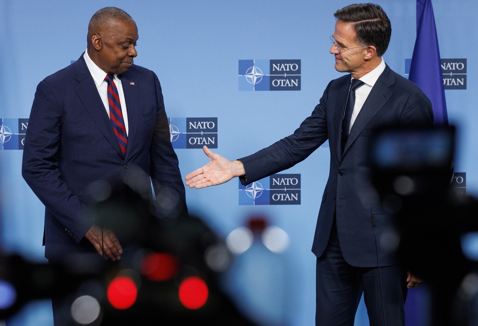 epa11664428 US Secretary of Defense Lloyd J. Austin III (L) and NATO Secretary General Mark Rutte address a joint press conference during the North Atlantic Treaty Organisation (NATO) Defense Ministers Council at the NATO Headquarters in Brussels, Belgium, 17 October 2024. Allied Defense Ministers meet in Brussels on 17-18 October 2024.  EPA/OLIVIER MATTHYS