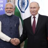 epa11674423 Russian President Vladimir Putin (R) and Indian Prime Minister Narendra Modi shake hands during their meeting on the sidelines of BRICS Summit at Kazan Kremlin in Kazan, Russia, 22 October 2024. The BRICS summit takes place from 22 to 24 October and is expected to be the largest foreign policy event ever held in Russia.  EPA/ALEXANDER ZEMLIANICHENKO / POOL