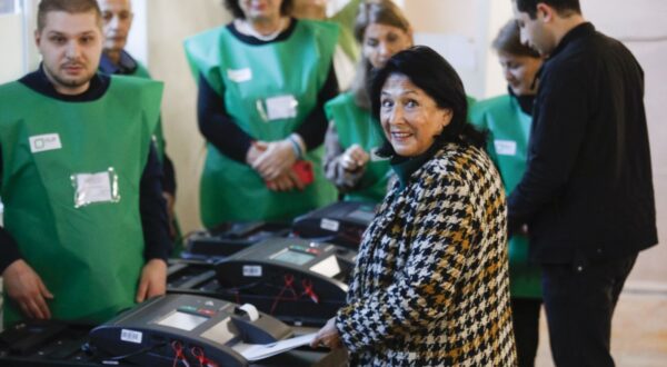 epa11684080 Georgian President Salome Zourabichvili casts her ballot at a polling station during parliamentary elections in Tbilisi, Georgia, 26 October 2024. A total of 18 parties are participating in the parliamentary elections in Georgia. Three thousand, one hundred and eleven polling stations opened for the parliamentary elections, including 67 abroad. Voting abroad will be possible in 53 cities in 42 countries.  EPA/DAVID MDZINARISHVILI