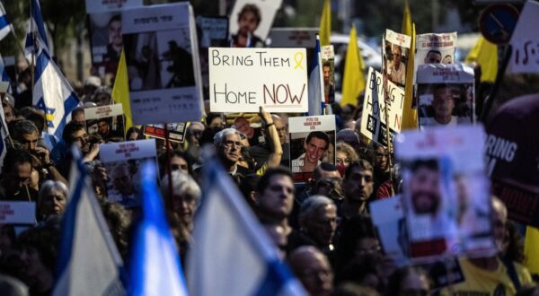 JERUSALEM - OCTOBER 7: Demonstrators carrying Israeli flags and photos of hostages, gather in front of the Israeli Prime Minister's Office, on October 7, 2024 in Jerusalem. Hundreds of people gathered in West Jerusalem to commemorate those who lost their lives and to demand the return of Israeli hostages to their homes. Mostafa Alkharouf / Anadolu,Image: 917550715, License: Rights-managed, Restrictions: , Model Release: no, Credit line: Mostafa Alkharouf / AFP / Profimedia