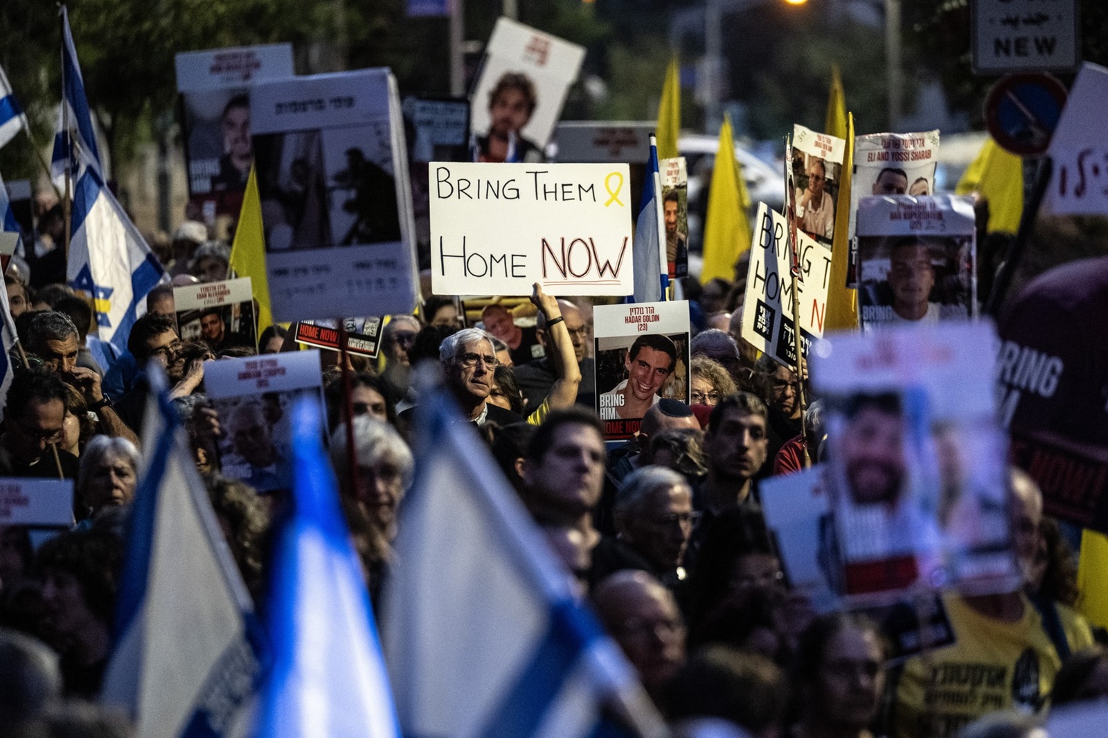 JERUSALEM - OCTOBER 7: Demonstrators carrying Israeli flags and photos of hostages, gather in front of the Israeli Prime Minister's Office, on October 7, 2024 in Jerusalem. Hundreds of people gathered in West Jerusalem to commemorate those who lost their lives and to demand the return of Israeli hostages to their homes. Mostafa Alkharouf / Anadolu,Image: 917550715, License: Rights-managed, Restrictions: , Model Release: no, Credit line: Mostafa Alkharouf / AFP / Profimedia