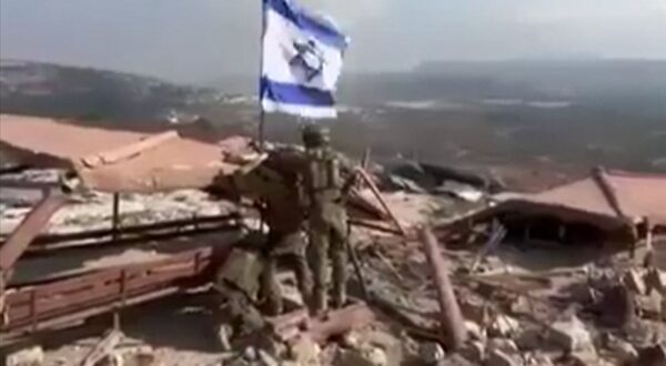 An image grab taken from a UGC video posted on social media on October 8, 2024 shows Israeli soldiers raising an Israeli flag in Lebanon's southern border village of Maroun al-Ras. Hezbollah said it had forced Israeli troops to retreat on October 8 after they crossed into Lebanon near a UN peacekeeping (UNIFIL) post following Israel's announcement last week it was conducting ground incursions.,Image: 918242524, License: Rights-managed, Restrictions: RESTRICTED TO EDITORIAL USE – MANDATORY CREDIT «  AFP PHOTO / UGC / ANONYMOUS  » - NO MARKETING NO ADVERTISING CAMPAIGNS – DISTRIBUTED AS A SERVICE TO CLIENTS [NO ARCHIVE]
BEST QUALITY AVAILABLE, ***
HANDOUT image or SOCIAL MEDIA IMAGE or FILMSTILL for EDITORIAL USE ONLY! * Please note: Fees charged by Profimedia are for the Profimedia's services only, and do not, nor are they intended to, convey to the user any ownership of Copyright or License in the material. Profimedia does not claim any ownership including but not limited to Copyright or License in the attached material. By publishing this material you (the user) expressly agree to indemnify and to hold Profimedia and its directors, shareholders and employees harmless from any loss, claims, damages, demands, expenses (including legal fees), or any causes of action or allegation against Profimedia arising out of or connected in any way with publication of the material. Profimedia does not claim any copyright or license in the attached materials. Any downloading fees charged by Profimedia are for Profimedia's services only. * Handling Fee Only 
***, Model Release: no, Credit line: AFP / AFP / Profimedia