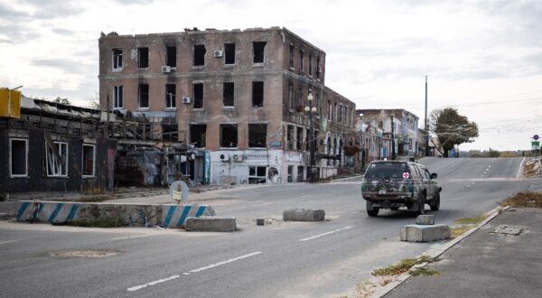 October 13, 2024, Kupyansk, Kharkiv, Ukraine: A military vehicle drives through a roadblock near destroyed buildings in Kupyansk.,Image: 921653111, License: Rights-managed, Restrictions: , Model Release: no, Credit line: Jay Kogler / Zuma Press / Profimedia