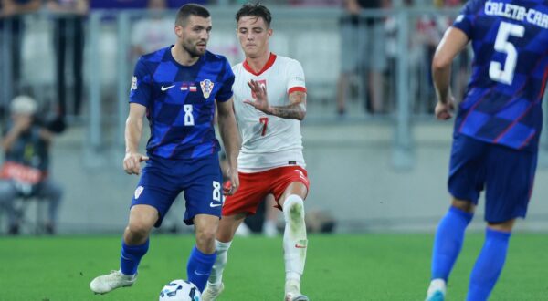 08.09.2024., Opus Arena, Osijek - UEFA Liga nacija, Liga A, skupina 1, 2. kolo, Hrvatska - Poljska. Mateo Kovacic, Kacper Urbanski. Photo: Davor Javorovic/PIXSELL