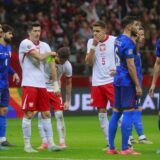 15.10.2024., Nacionalni stadion PGE, Varsava, Poljska - UEFA Liga nacija, Liga A, skupina 1, 4. kolo, Poljska - Hrvatska. Robert Lewandowski, Jan Bednarek Photo: Jacek Szydlowski/Forum/PIXSELL