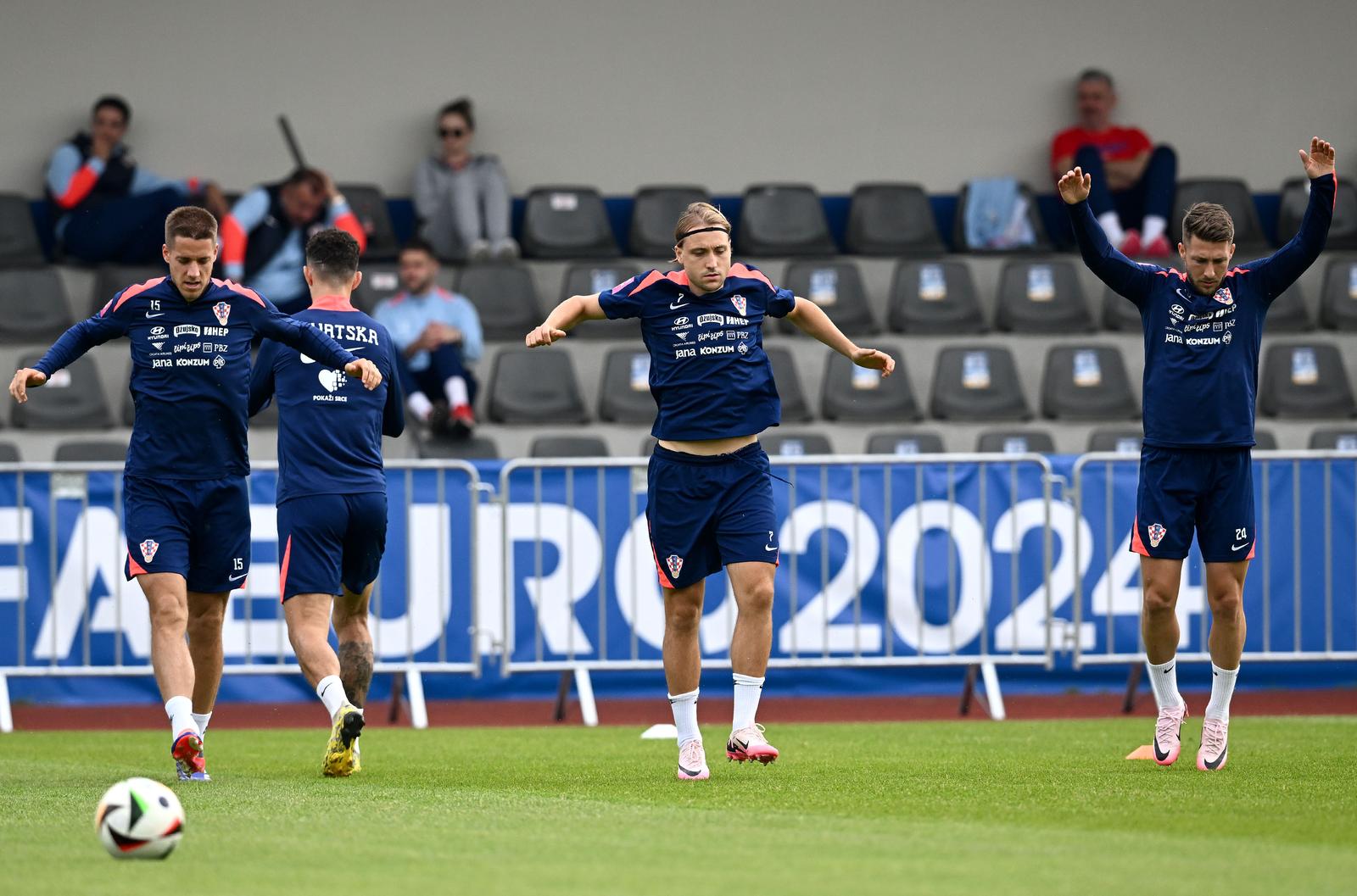 21.06.2024., Neuruppin, Njemacka - Europsko prvenstvo 2024. Trening hrvatske nogometne reprezentacije na trening-igralistu Volksparkstadion. Mario Pasalic, Lovro Majer, Ivan Perisic Photo: Marko Lukunic/PIXSELL